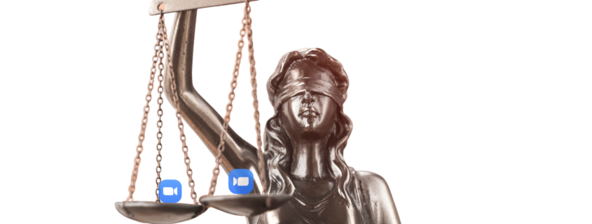 bronze statue of justice holding two zoom icons in her scales